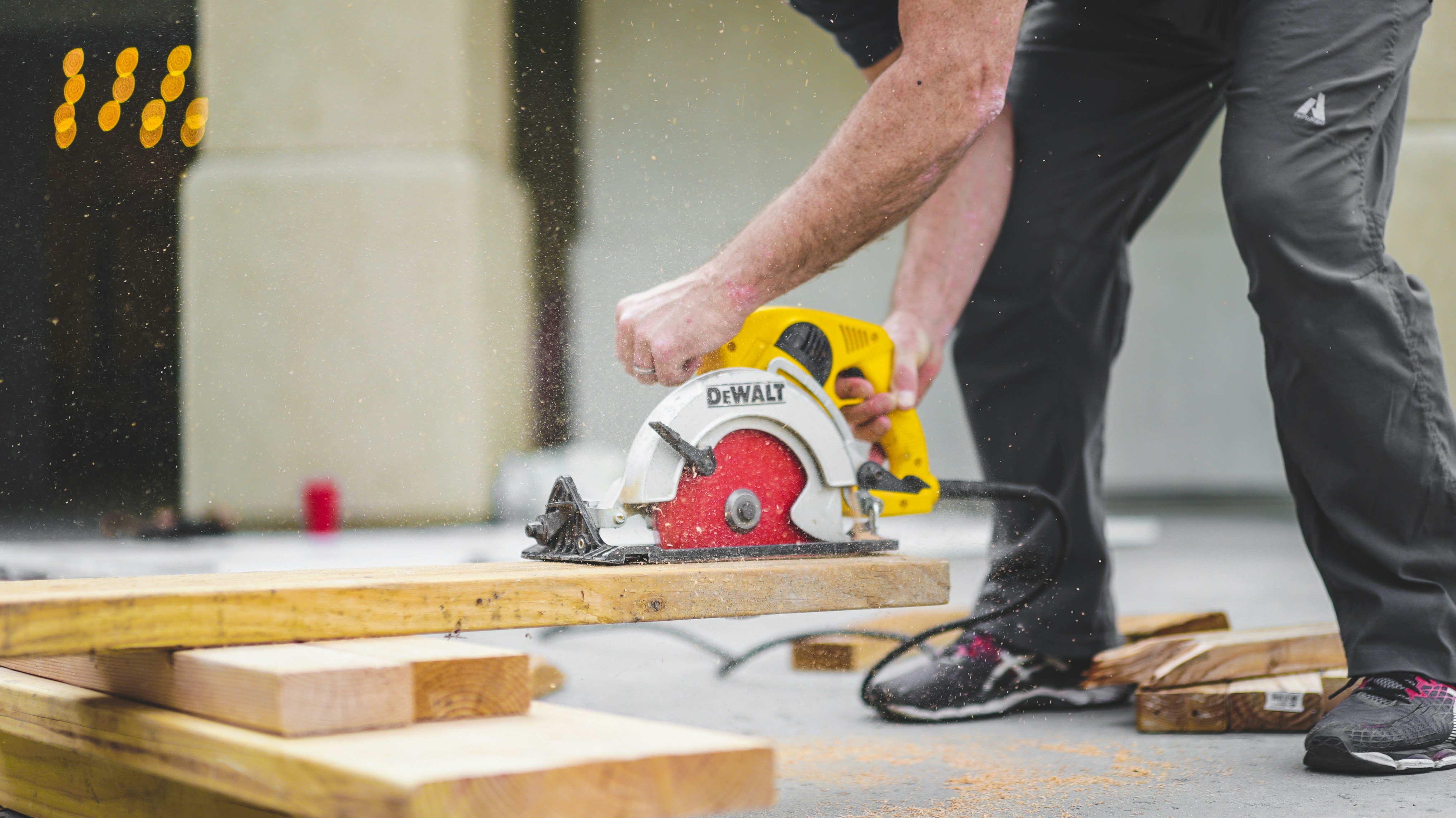 Cutting pressure-treated lumber in action