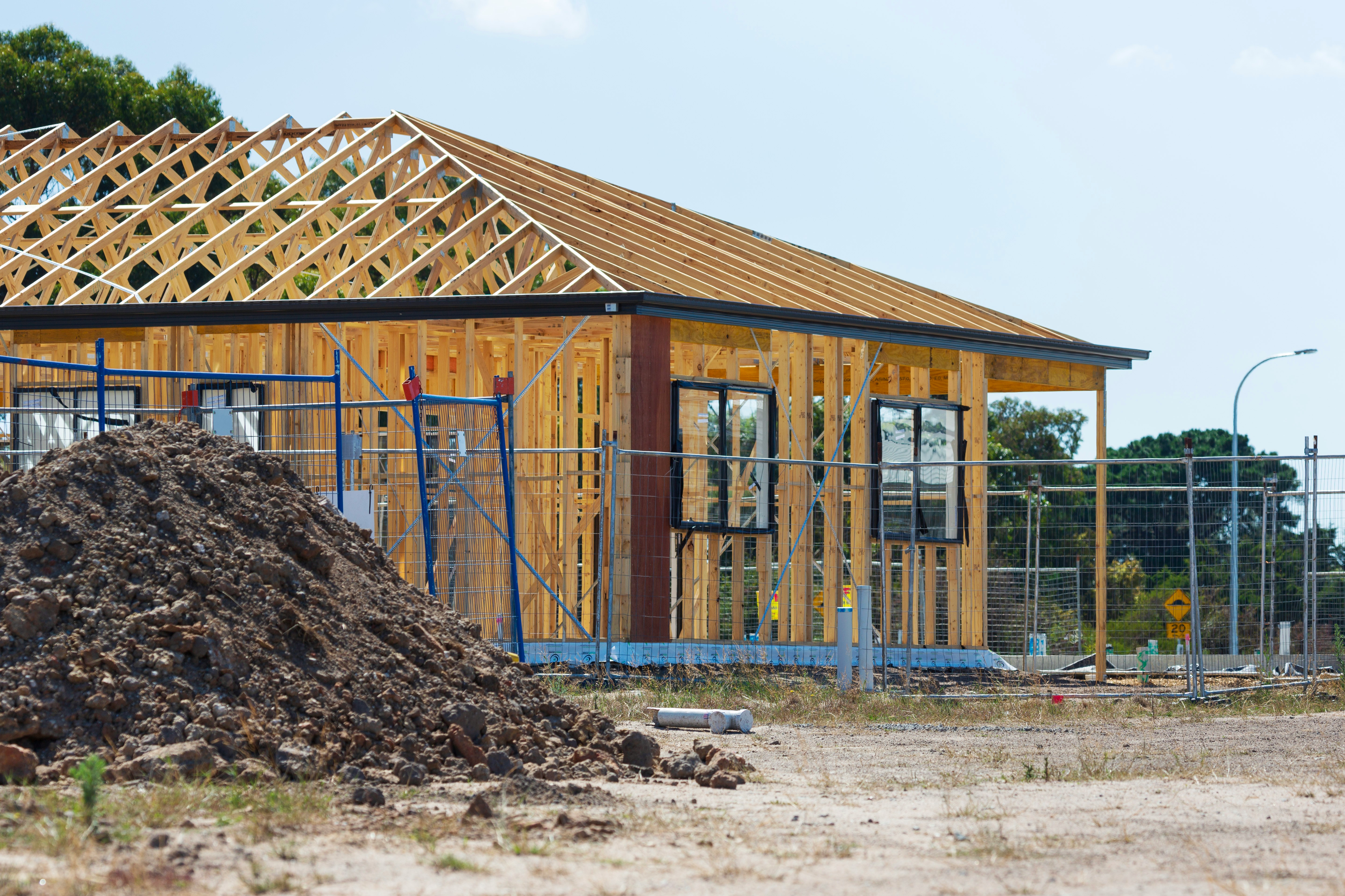 Wooden building with completed fiber cement siding installation