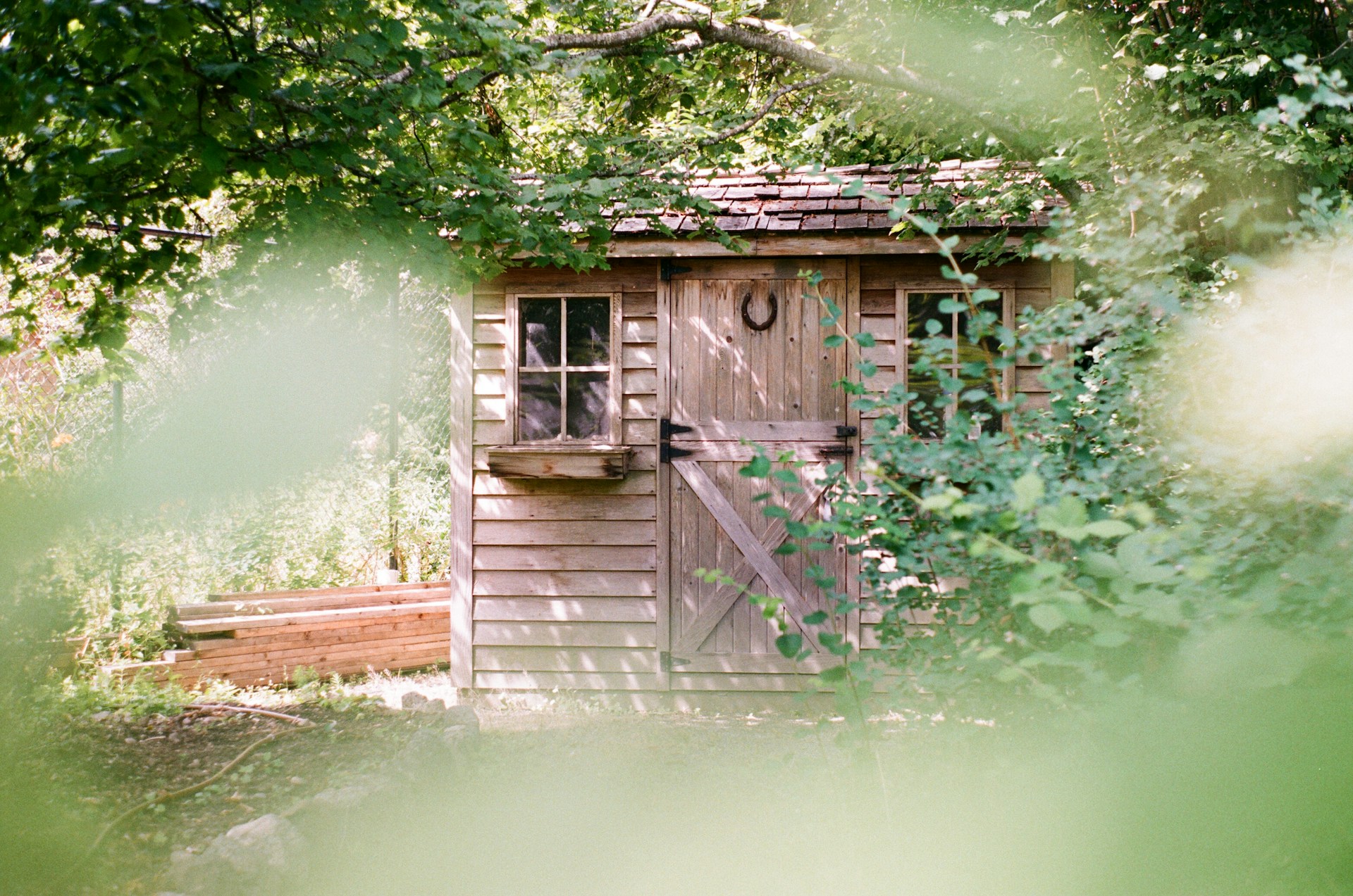 Metal vs. Resin vs. Wood Sheds: Material Comparison for 2026